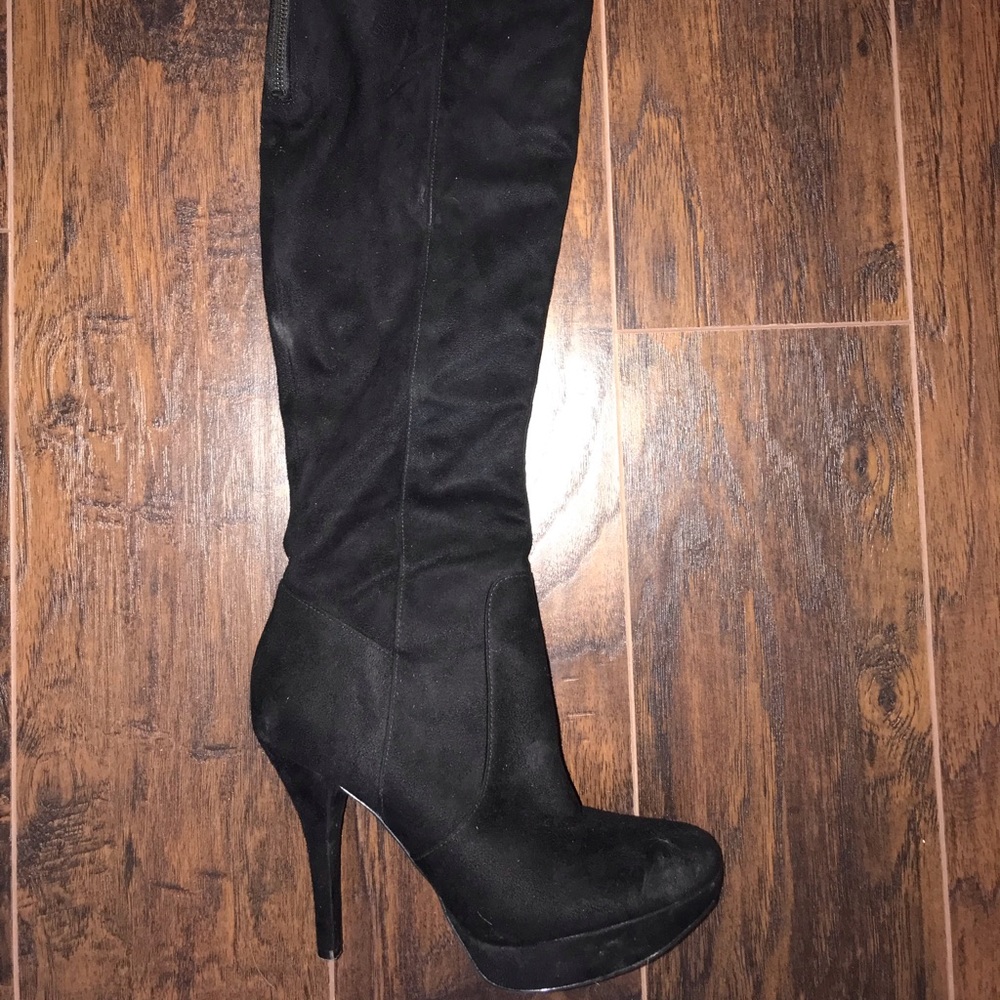 Black over the knee high heeled boots